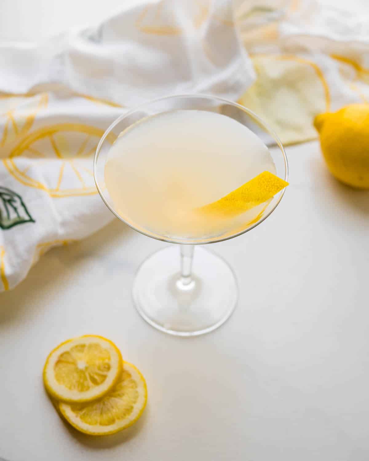 A lemon gin 20th Century cocktail in a martini glass.