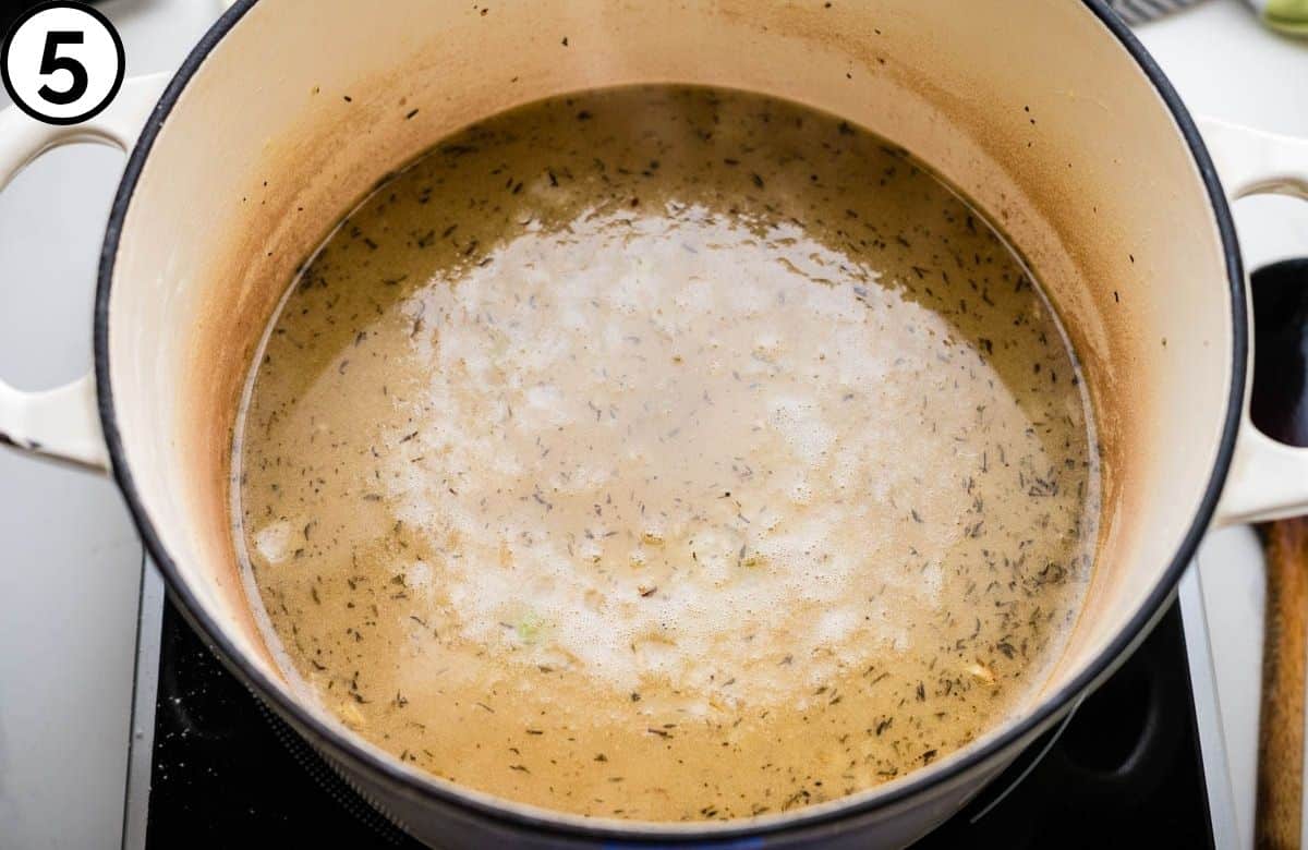 Increase the temperature and bring the soup base to a bubbling simmer.