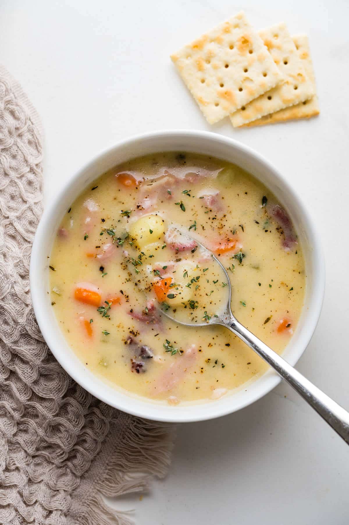 Serving saltines with the ham potato soup.